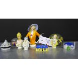 A mixed lot to include four porcelain dolly heads, two Millefiori style glass paperweights and a