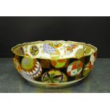 A Japanese porcelain fruit bowl painted with geometric patterned spheres