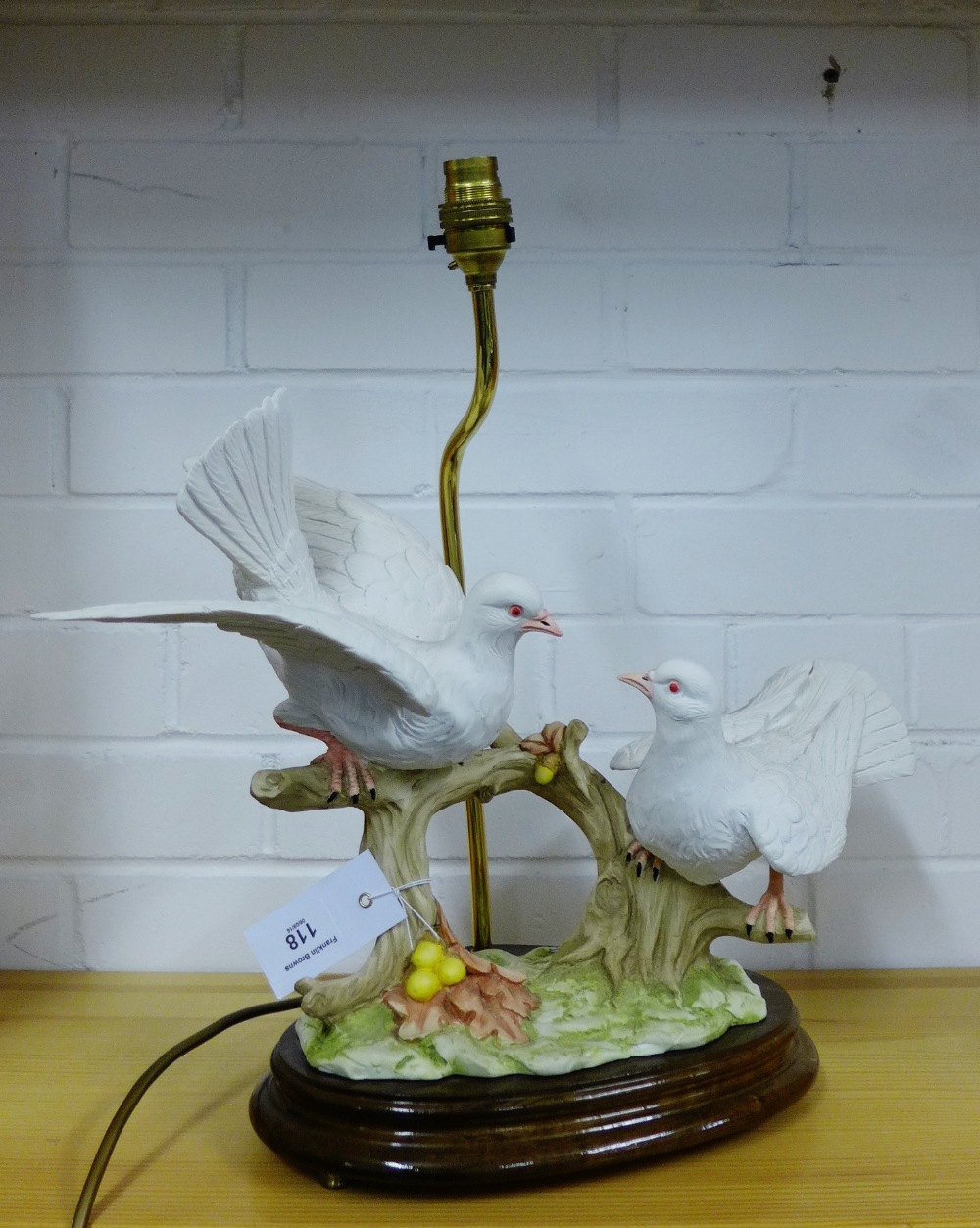 A Capodimonte Doves table lamp on polished wood base, size excluding light fitting 38cm high