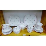 A Shelley 'Bridal Rose' pattern fine bone china tea set comprising two cake plates, seven cups,