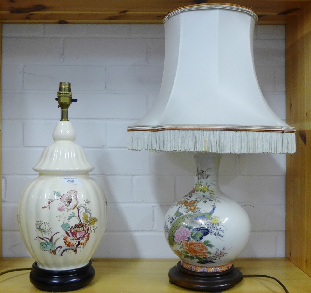 Two floral decorated table lamps on turned wood bases, (2)