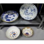 A collection of 18th century and later Chinese blue and white plates to include two brown rimmed