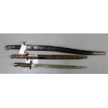 A group of three British WWI bayonets to include two with scabbards (3)