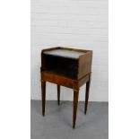 A 19th century walnut bedside table with a grey marble top over an open recess above single drawer