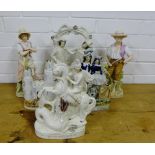 A collection of Staffordshire flat back figures to include St. George, a Scottish figure group,