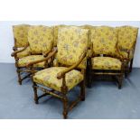 A set of eight stained hardwood open armed dining chairs with upholstered backs and seats on