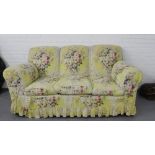 Edwardian three seat sofa, early 20th century, with loose floral covers, on bun feet, 185 x 86cm