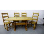 A five piece Country Pine dining set comprising a plank top table on trestle supports, together with