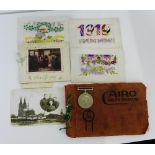 A WWII Defence medal together with three embroidered postcards and a Cairo and its Environs album (a