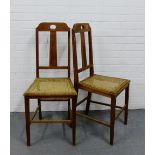 A pair of oak Arts & Crafts side chairs with cane seats (2)