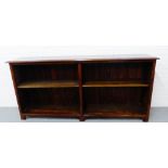 A mahogany open bookcase, the rectangular top over a planked back with adjustable shelves on bracket