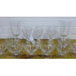 Various glass wares to include a set of six wine glasses, two etched celery glass vases and a set of