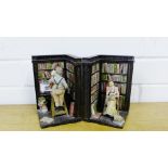 A pair of novelty resin book ends, modelled as a library interior with figures on a ladder (2)