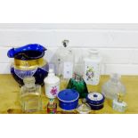 A collection of 19th century and later scent bottles and jars, together with an enamel blue glass