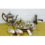 A quantity of Epns wares to include a coffee pot, sauce boats, sugar scuttle, cruets, knife rests