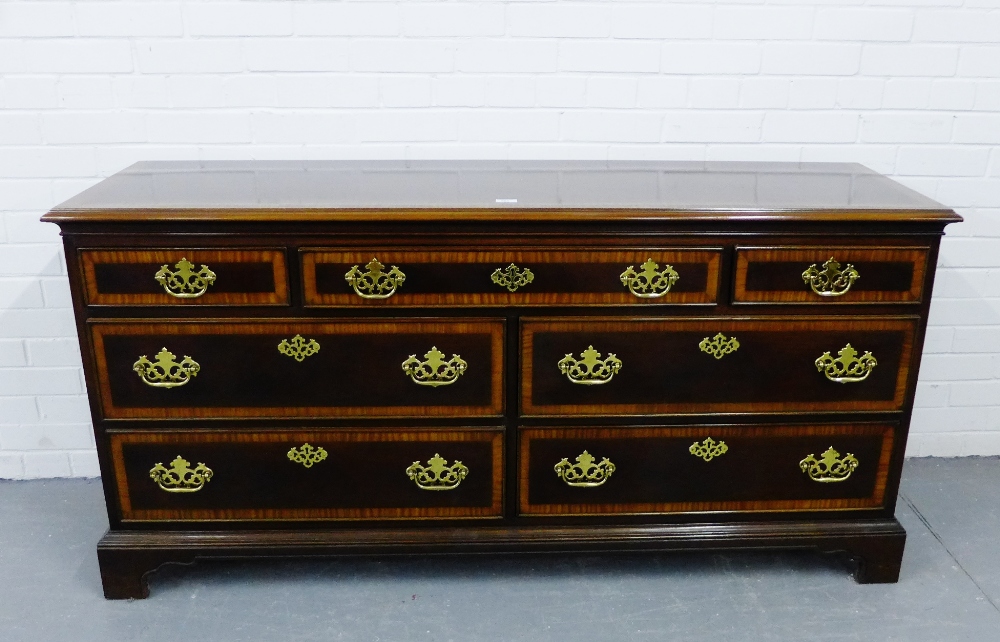 A mahogany chest, the moulded rectangular top above an arrangement of one long and two short drawers