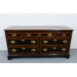 A mahogany chest, the moulded rectangular top above an arrangement of one long and two short drawers