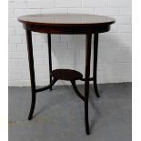 A mahogany and satin inlaid oval side table on tapering inlaid supports and undertier, 66 x 73cm