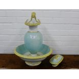 A Staffordshire pale blue glazed mask head jug and ewer set together with an oblong dish and