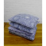A set of five cushions with blue and white snowflake and flower pattered covers (5)
