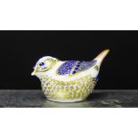 A Royal Crown Derby paperweight in the form of a bird with a gold stopper to base