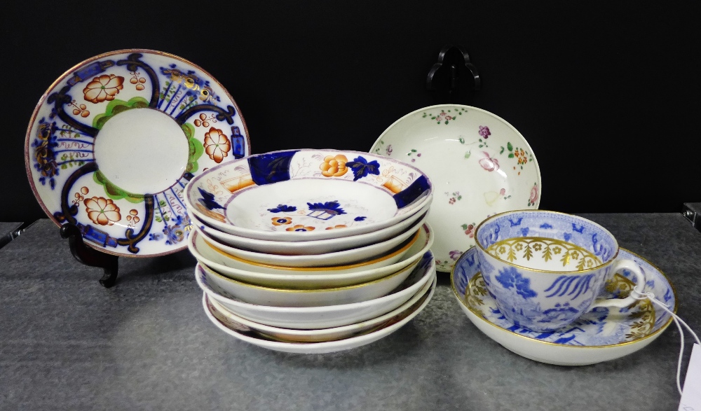 A quantity of 18th and 19th century saucers to include Derby and Gaudy Welsh and Staffordshire