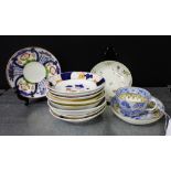 A quantity of 18th and 19th century saucers to include Derby and Gaudy Welsh and Staffordshire