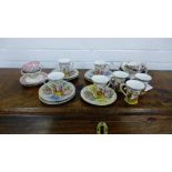 A quantity of continental porcelain cups and saucers in the Helena Wolfsohn manner, (22)