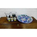 A mixed lot to include two clear glass vases with green glass pebbles, a large blue floral painted