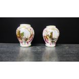 A pair of 19th century Dresden porcelain baluster vases, the white ground painted with riverside