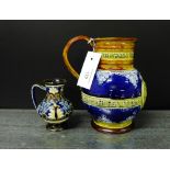 A Doulton stoneware Queen Victoria commemorative jug, inscribed 'She wrought her people, lasting