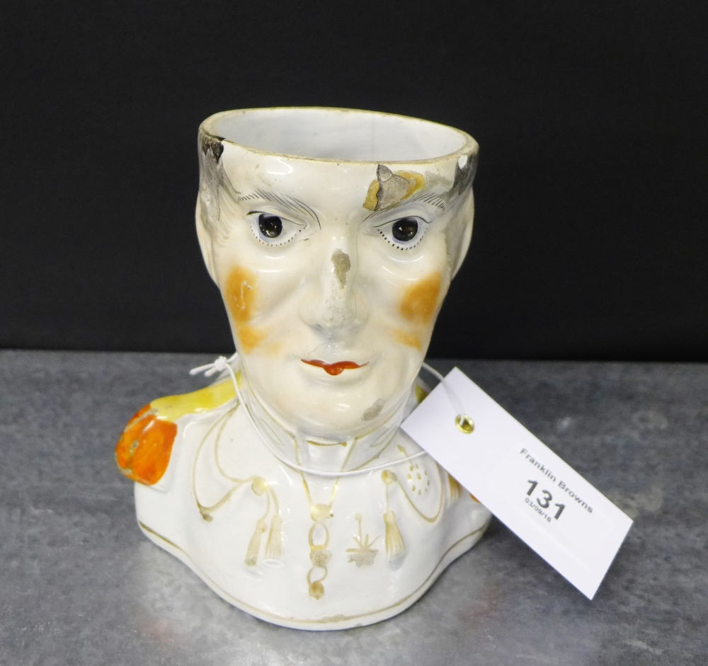 A pearl ware Toby of a General, 14cm high (a/f)