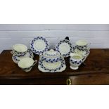 A Royal Doulton Coventry pattern tea set, comprising five cups, six saucers, six side plates, a cake