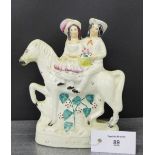 A Staffordshire flat back figure "Going to Market", 22cm high