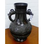 A large bronze Archaistic two handled vase, 50cm high