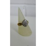 A 9 carat gold diamond cluster dress ring, UK ring size T