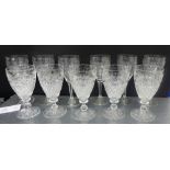 A set of six wine glasses together with five hobnail cut glasses (11)