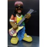 A painted resin figure 'Bob Marley' 37cm high