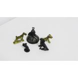 A group of novelty bronze and brass dogs and a desk bell, (5)