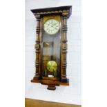 A mahogany cased wall clock, the enamel dial with Roman numerals, 100 x 50cm