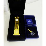 A Swarovski and gilt metal miniature champagne bottle together with a Classic Timepieces gilt