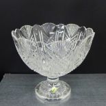 A Waterford crystal bowl with serrated edge and raised on a pedestal footrim, 25 x 28cm