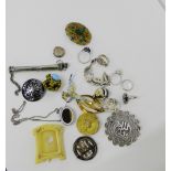 A mixed lot to include six silver dress rings, silver moonstone brooch, silver bracelet, gold plated