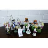 A collection of ten various porcelain figures to include a white glazed cherub, continental figures,