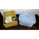 A vintage pale blue enamel 'Cake' tin and cover together with 'The Supreme' vintage hairdryer with