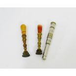 Two agate and gilt metal seals together with a white metal propelling pencil (3)