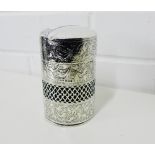 An Edwardian foliate scroll engraved silver canister with pierced design around the centre, the