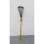 A vintage lacrosse stick, stamped 'Viktoria, Eccles, Lancs'