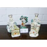 A pair of Staffordshire white glazed and gilded male and female figures, each modelled seated with a