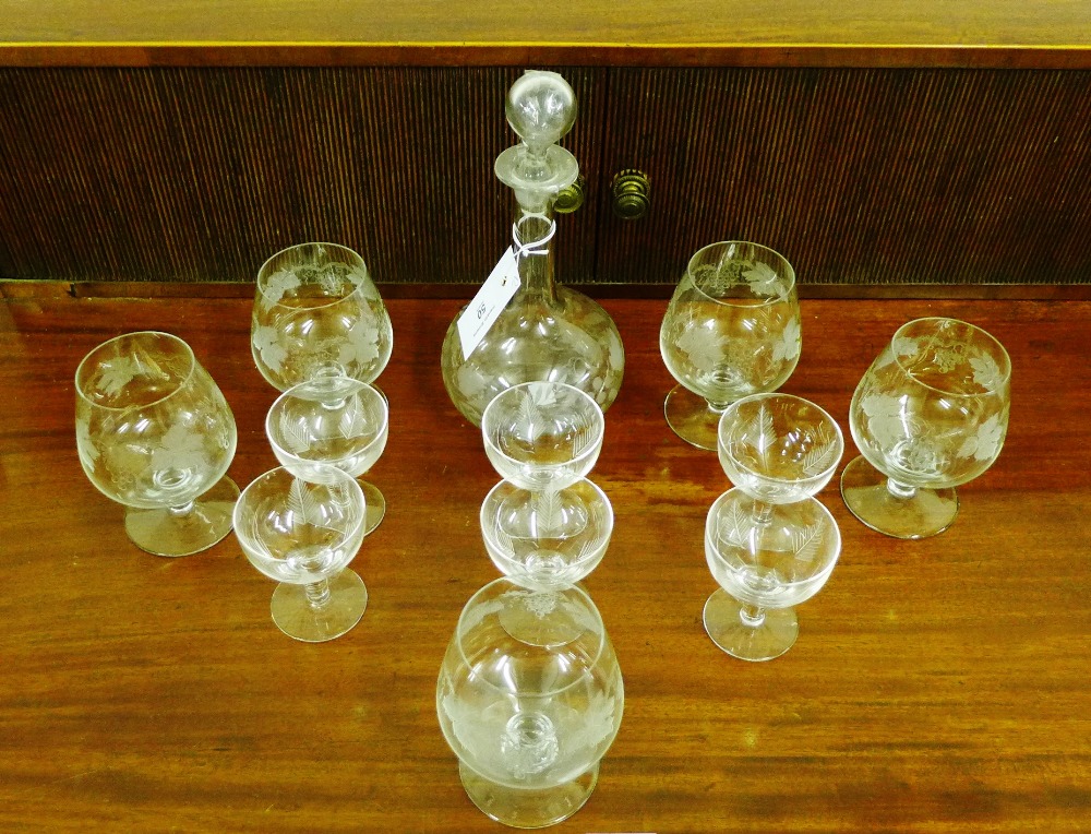 An etched glass decanter and stopper together with various etched drinking glasses, (12)